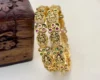 Matte Gold Traditional Laxmi Design with American Diamond Stone Brass Make Bangles – Kasim Jewellers
